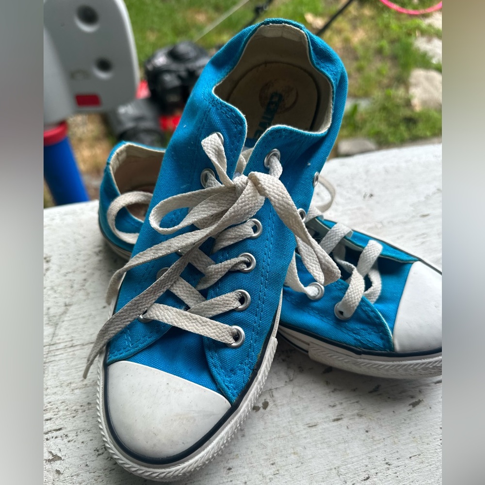Bright blue converse all stars low top sneakers